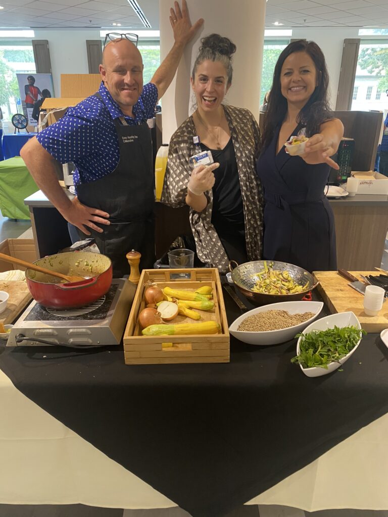 Chef Mike Bacha, Kip Hardy, and Krystyna Morgan, MPH, during a cooking demo at the Health Expo for Emory employees.